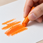 Imagen referencial generada: uso de un pastel al óleo naranja sobre papel