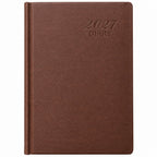 Agenda Diver Class DC/63 2027, SKU 40092-2: cubierta marrón clásica con inscripción 2027 DIARY, portada principal. Fotografía retocada sobre blanco sin envoltorio.