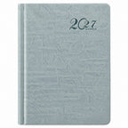 Agenda Diver Class DC/60 2027, SKU 41229-1: cubierta azulada pastel. Fotografía retocada sobre blanco sin envoltorio.