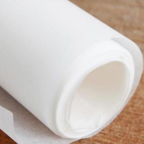 Pergamino En Todos Los Tamanos Rollo De Pliegos Sobre Madera