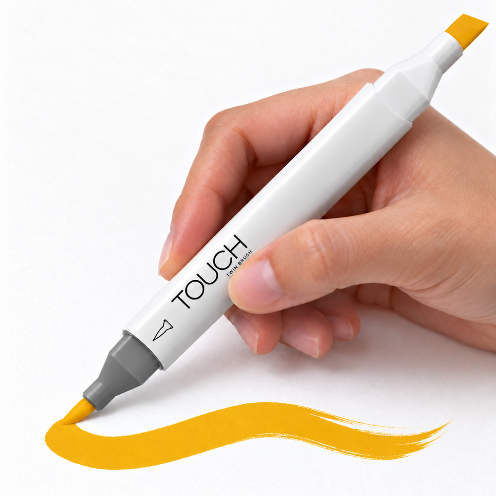 Imagen referencial de uso del marcador ShinHan TOUCH TWIN BRUSH YR31 DARK YELLOW, cuerpo blanco y doble punta pincel y cincel. Presentación por unidad.